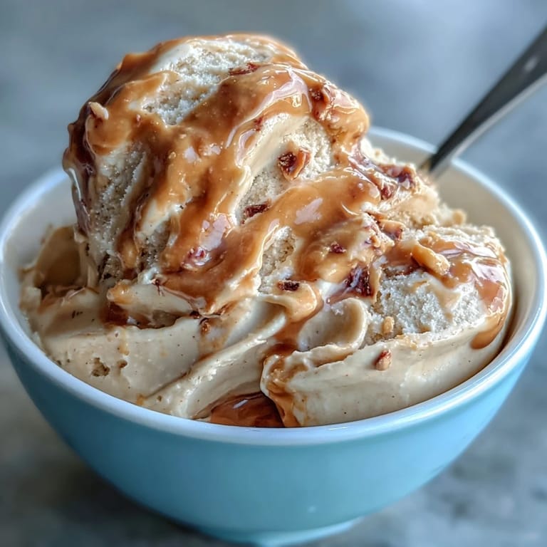 A smooth, dairy-free 4-ingredient peanut butter banana ice cream dish.